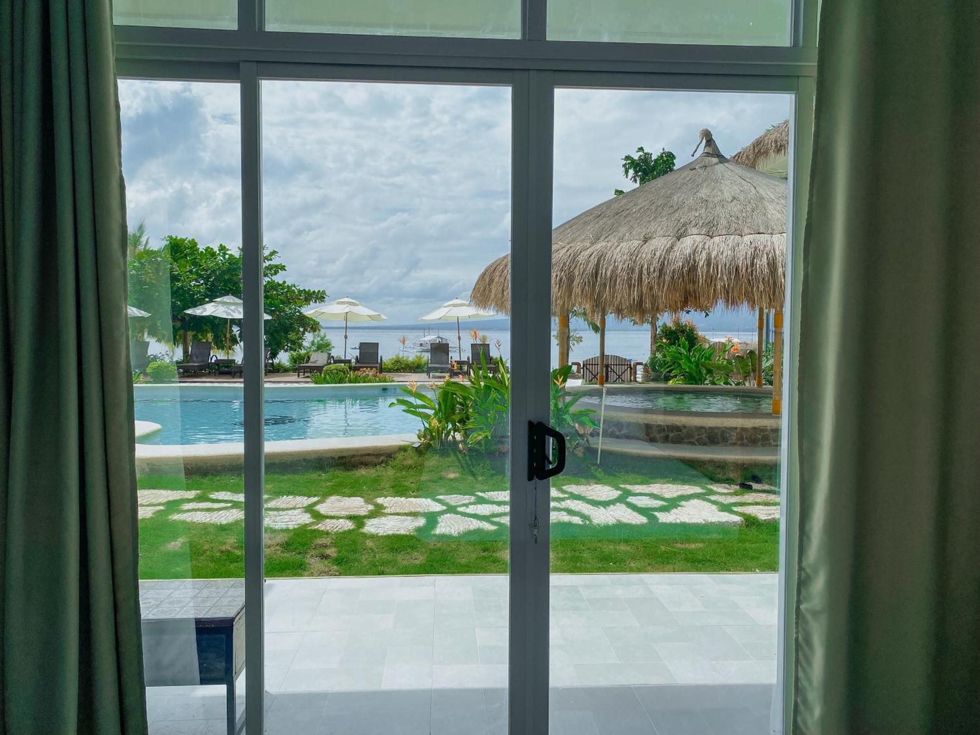 Avila'S Horizon Dive Resort Santander Extérieur photo